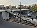 The stairscases connecting the Crossroads Square with the bus stops at People's Army Avenue in 2022.