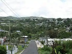 Street and homes on mountainside in Unibón