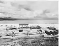 Taken on 10 December 1943, this photo shows Vought F4U-1 Corsair aircraft of VMF-123 and VMF-124, Grumman F6F-3 Hellcats, a Douglas SBD Dauntless, and RNZAF Curtiss Kittyhawk Mk.IV (P-40F) at Barakoma Airfield