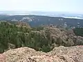 View from the top of the Devil's Head Lookout. Pike National Forest is in the foreground, while the city of Denver is in the distance.