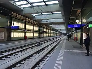 Underground double-track railway line with side platforms