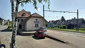 Two-story building next to tracks