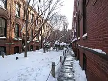 "Workingman's Cottages" built by philanthropist Alfred Tredway White as low-cost housing (1876)