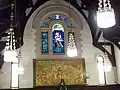 Interior, chandeliers, stained glass.