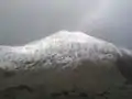 Y Lliwedd in snow from the flank of Yr Aran