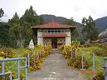 Norbugang Chorten to the right of the Yuksom Dubdi Gompa