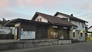 Two-story building with gabled roof